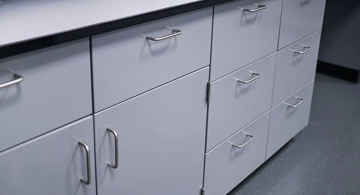 FF-1 Light grey metal laboratory base cabinets with drawers and stainless steel handles